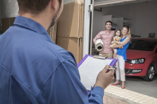 Man and van loading furniture in Colliers Wood