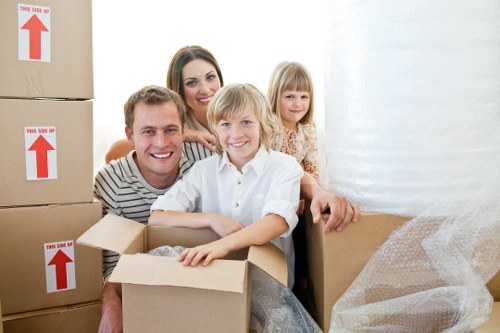 Packing and loading household items for a Colliers Wood home move